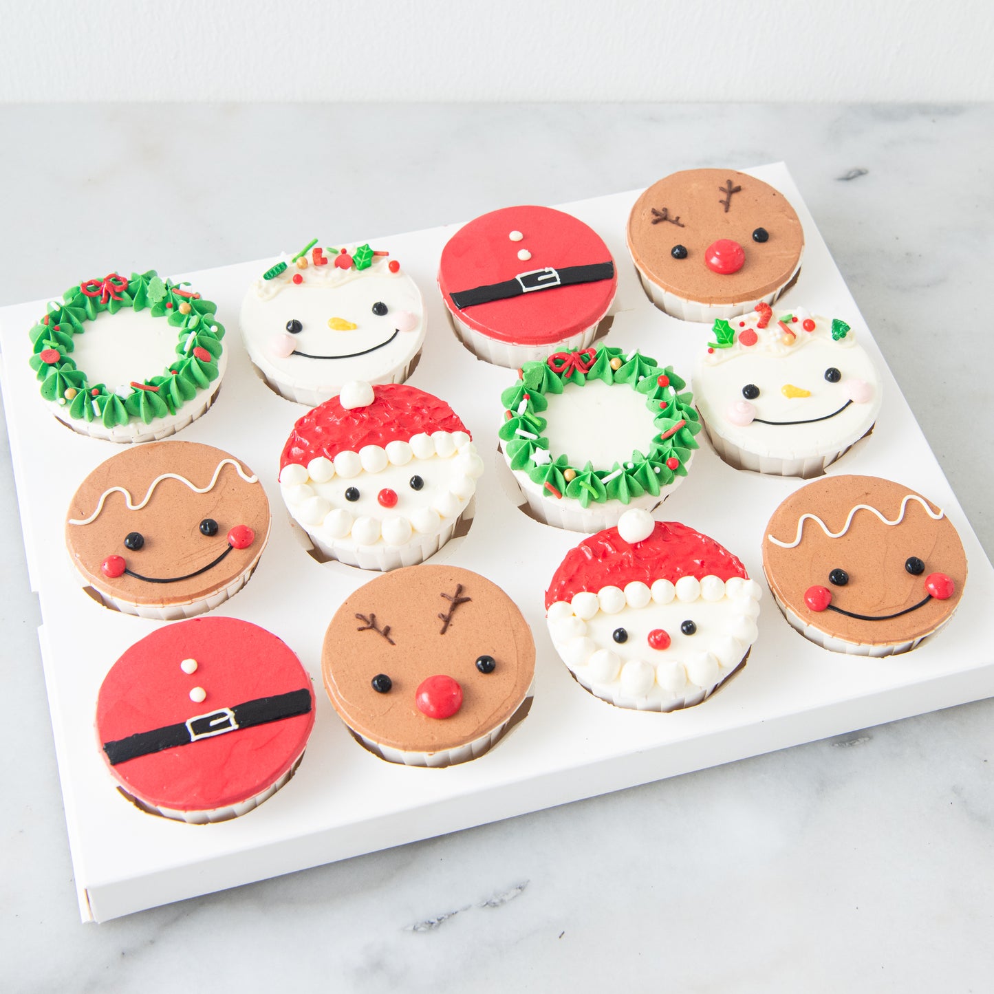 Ho Ho Ho! Merry Christmas | 12pc Santa & Friends Cupcakes | $78.80 Nett