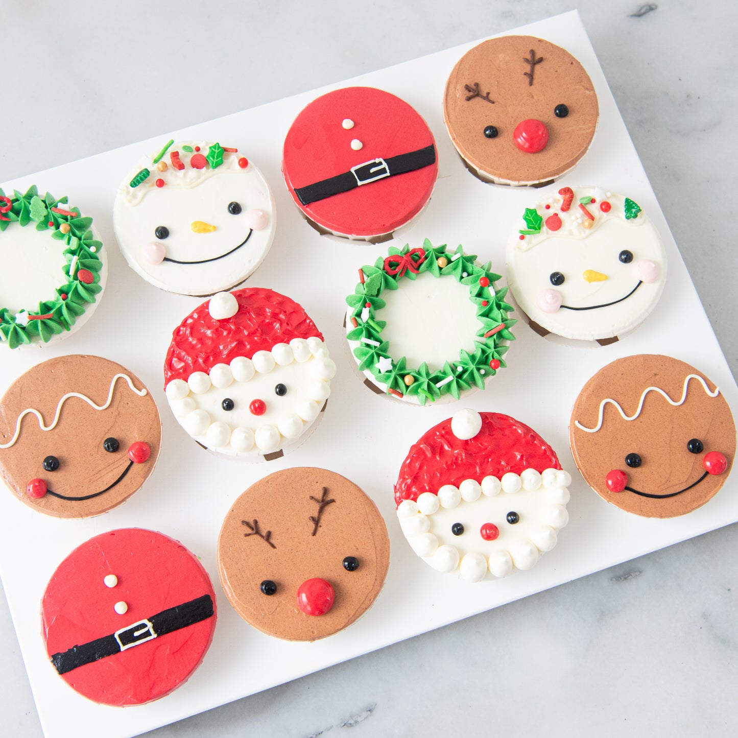 Ho Ho Ho! Merry Christmas | 12pc Santa & Friends Cupcakes | $78.80 Nett