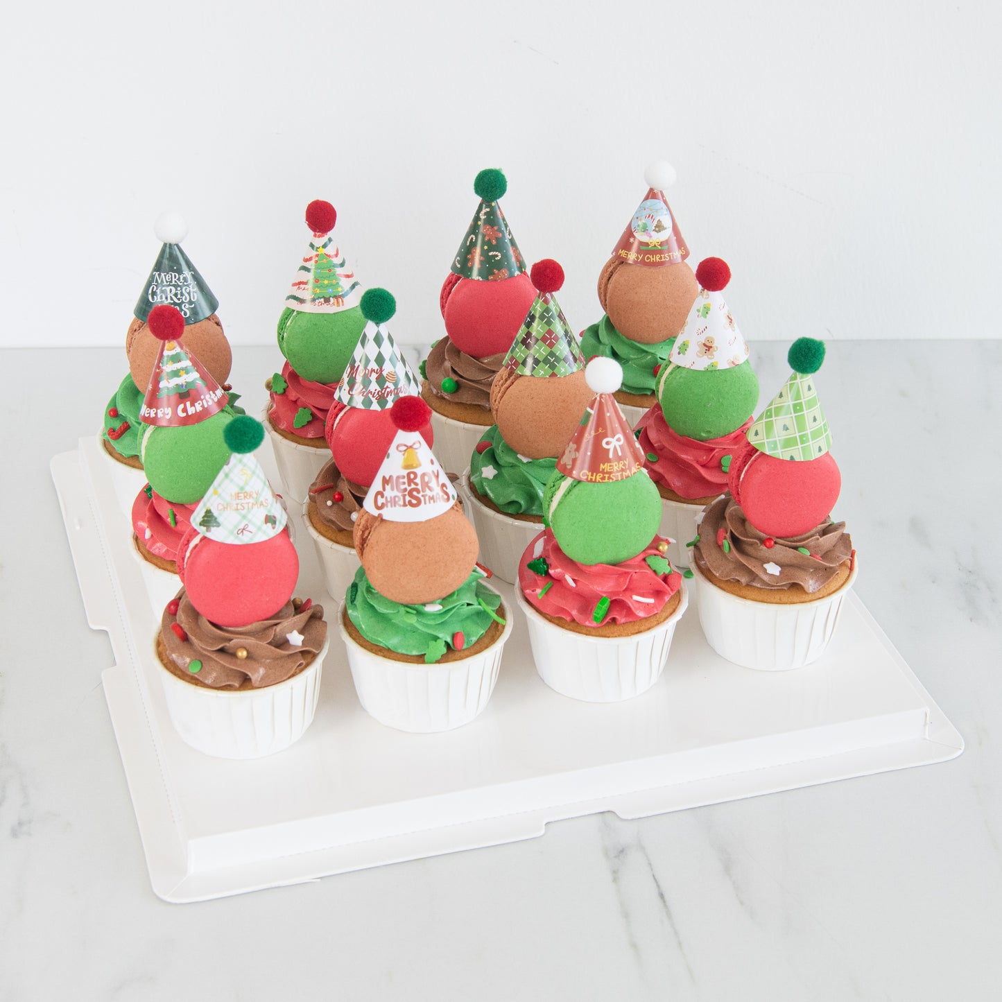 Ho Ho Ho! Merry Christmas | Santa's 12pcs Macaron cupcakes with party hat | $68.80 Nett