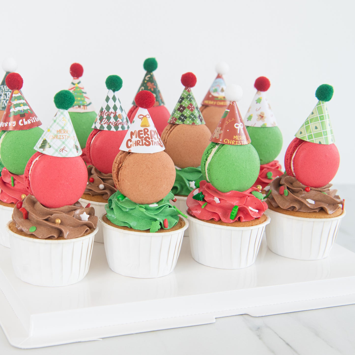 Ho Ho Ho! Merry Christmas | Santa's 12pcs Macaron cupcakes with party hat | $68.80 Nett