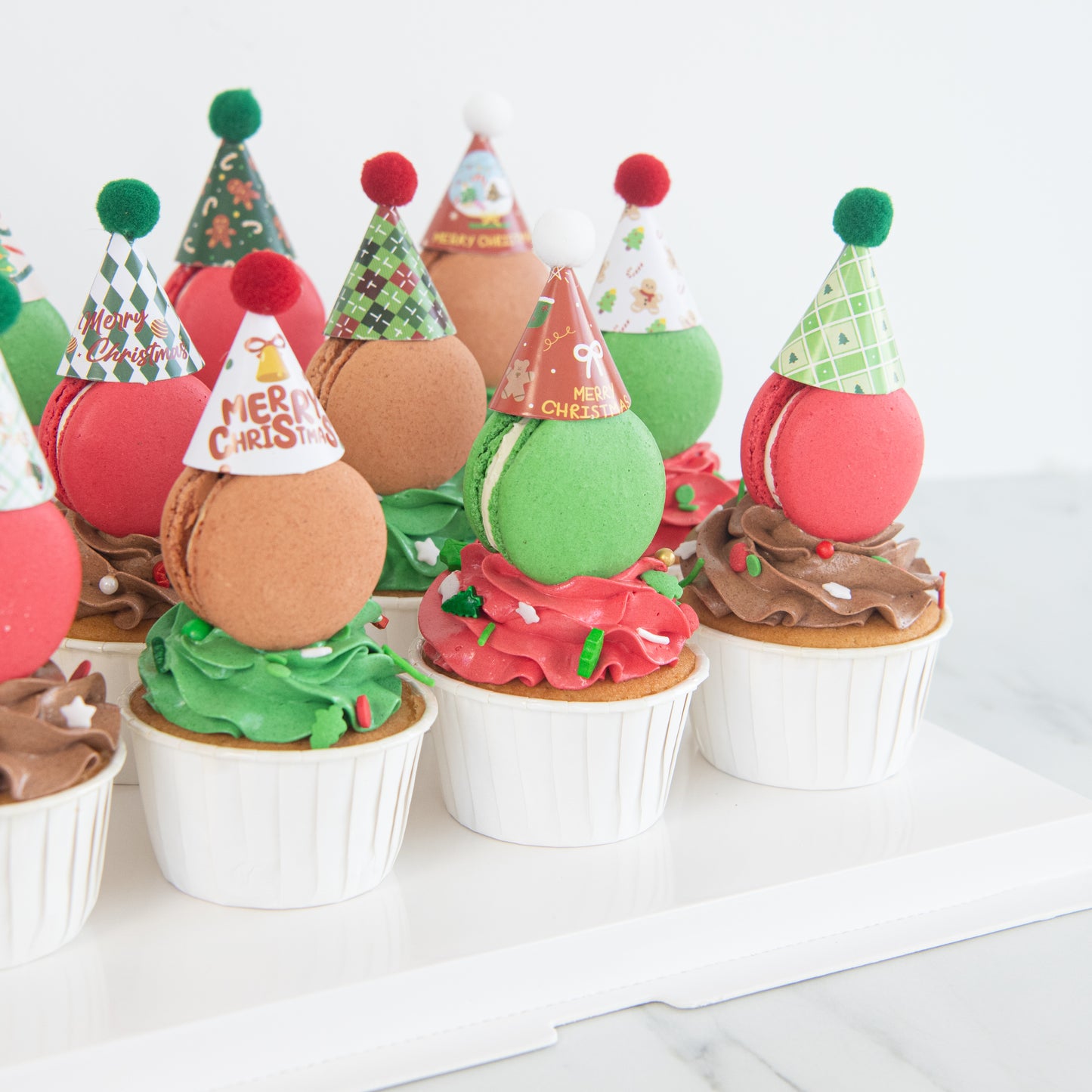 Ho Ho Ho! Merry Christmas | Santa's 12pcs Macaron cupcakes with party hat | $68.80 Nett